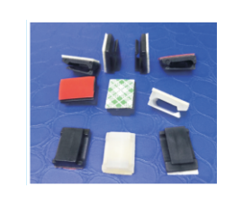 Self-adhesive clamp